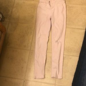 I am selling these pink ripped cute jeans